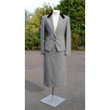 An Options at Austin Reed black and white two piece skirt suit, Dormeuil pure new wool, with black