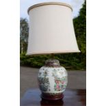 A Chinese ginger jar converted into a lamp base; depicting flowers and butterflies, 54cm high.