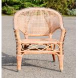 A wicker child's armchair.