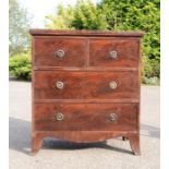 A 19th century mahogany chest of drawers, two short over two long drawers, with hoop handles,