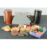 A group of leather purses, coin pouches, lens cases and jewellery boxes.