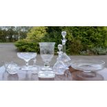 A group of glassware to include decanters, pedestal dishes, fruit bowl, candlestand and shoe.