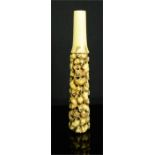 A rare early 19th century Japanese ivory carving by Masamitsu, possibly a parasol handle, carved