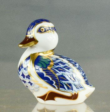 A Royal Crown Derby duckling LXI.