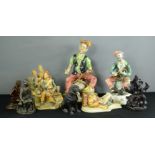 A group of ceramics including Capo Di Monte figure groups.