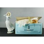 A Lladro figurine, no 4.936, Viento de Primavera, 36cm high, with the original box and packaging.