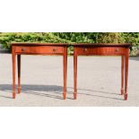 A pair of side tables, mahogany with single drawers and spade feet.