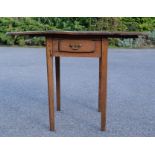 A 19th century elm pembroke table, the dropl-leaves raised on slides, square tapered legs.