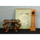 A watchstand in the form of a longcase clock, a Chinese hardwood stand, and a map of Rutland.