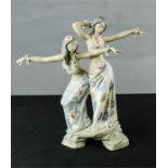 A Lladro figure group, young hula girls dancing, 31cm high.