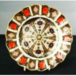 A Royal Crown Derby plate, scalloped edge, Old Imari pattern.