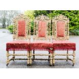 Three carved oak French chairs, with barleytwist supports and stretchers.