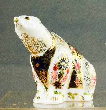 A Royal Crown Derby polar bear LXI.