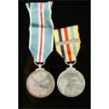 Two medals to DUR EJ Denny RASC T/23237564; a silver medal For Service in the Suez Canal Zone, and A