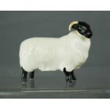 A Beswick ram, 8cm high.