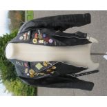 A ladies leather jacket, with numerous Rockabilly badges, and Betty Boop badge, size S.