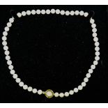 A Bulgari pearl and 18ct gold clasp necklace, 45.9mm cultured pearls, with an onyx disc clasp set