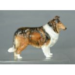 A Royal Doulton Rough Collie dog, 14cm high.