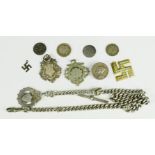 A silver chain and fob, two silver tags, silver threepennies, and other items, 2.10toz total.