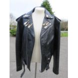 A gent's MDK black leather biker jacket, with eight Hard Rock Cafe badges, size 42