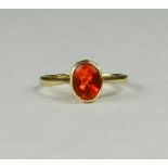 A 9ct gold and tangerine garnet ring, size N/O, 1.8g.