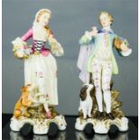 A pair of German porcelain figures.