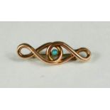 A 9ct rose gold sweetheart brooch, set with turquoise, 2.5g.