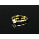 A yellow gold diamond solitaire ring, 1.5g, size L.