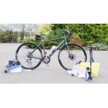 A Giant Escape Disc fast road bike, size M together with spare saddle, tyre pump, Giant bike