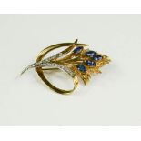 A 9ct gold (unmarked) brooch in the form of a wheat sheaf, with diamond chips, 8.3g.