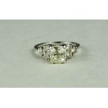 An unmarked platinum and diamond ring, the central cushion cut diamond; 1.85ct SI clarity M/O