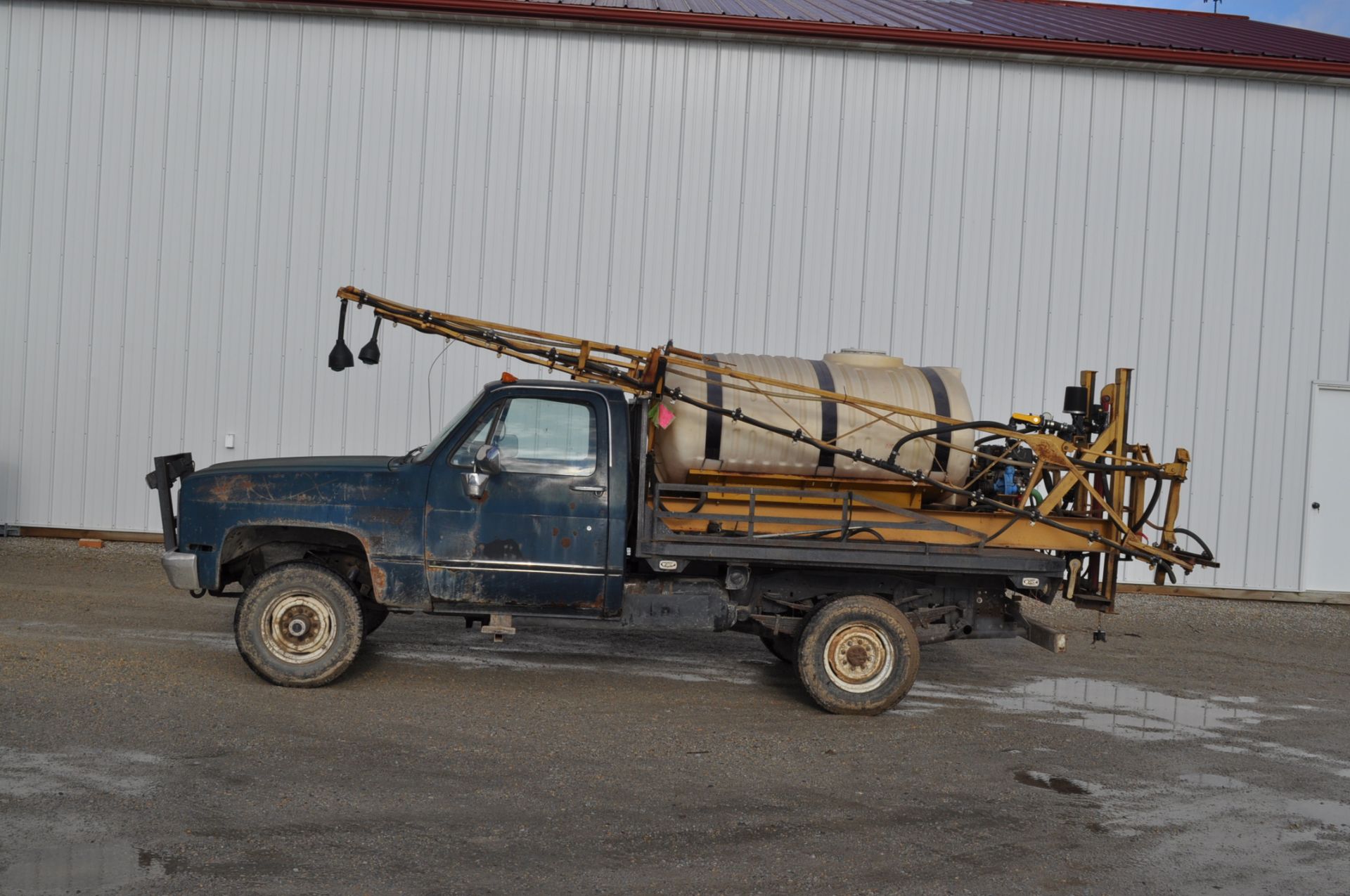 1985 1 ton Chevy pickup truck, flatbed with 400 gal skid sprayer, 40' booms, elec over hyd, 350 - Image 19 of 25