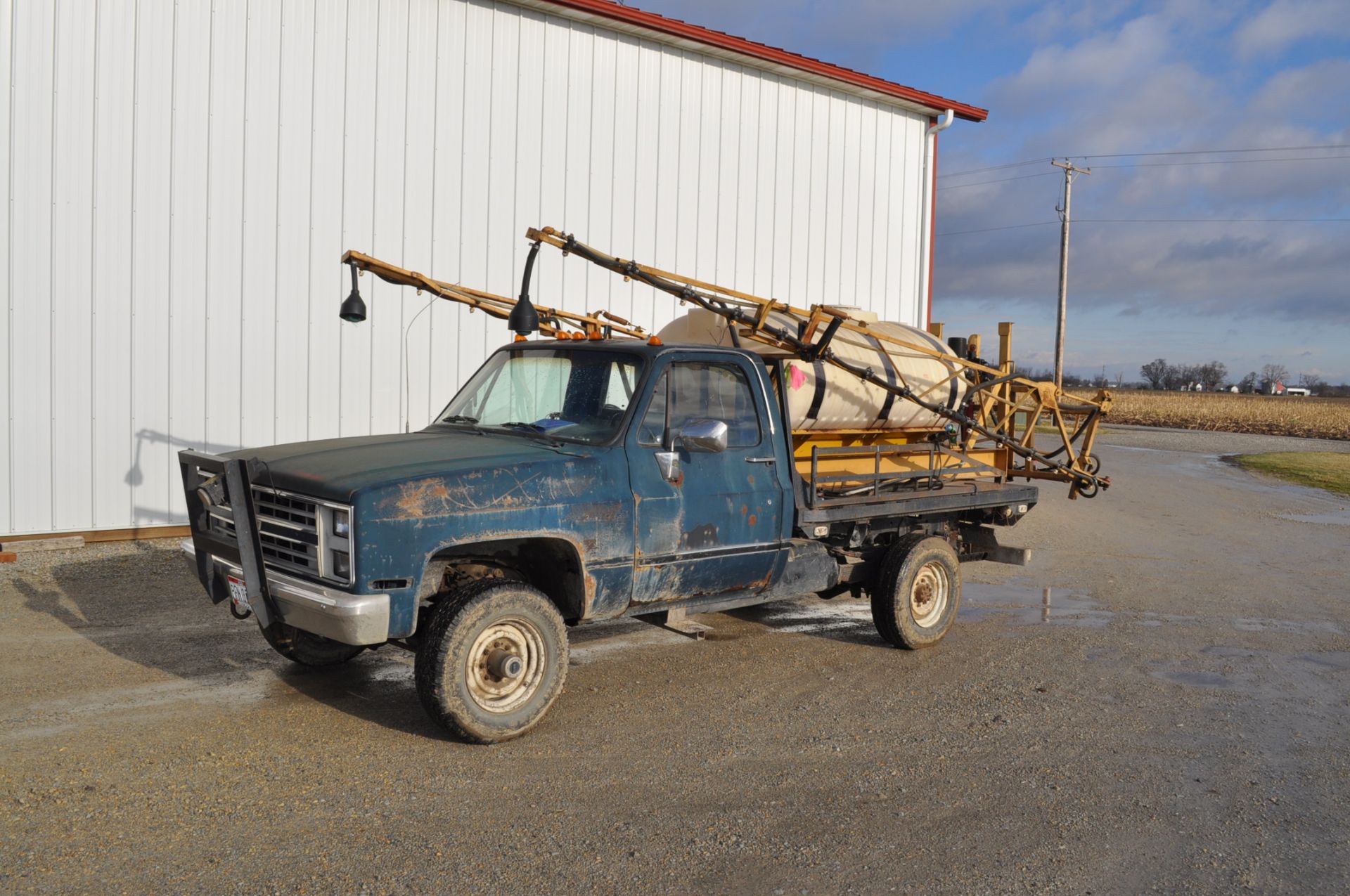 1985 1 ton Chevy pickup truck, flatbed with 400 gal skid sprayer, 40' booms, elec over hyd, 350 - Image 18 of 25