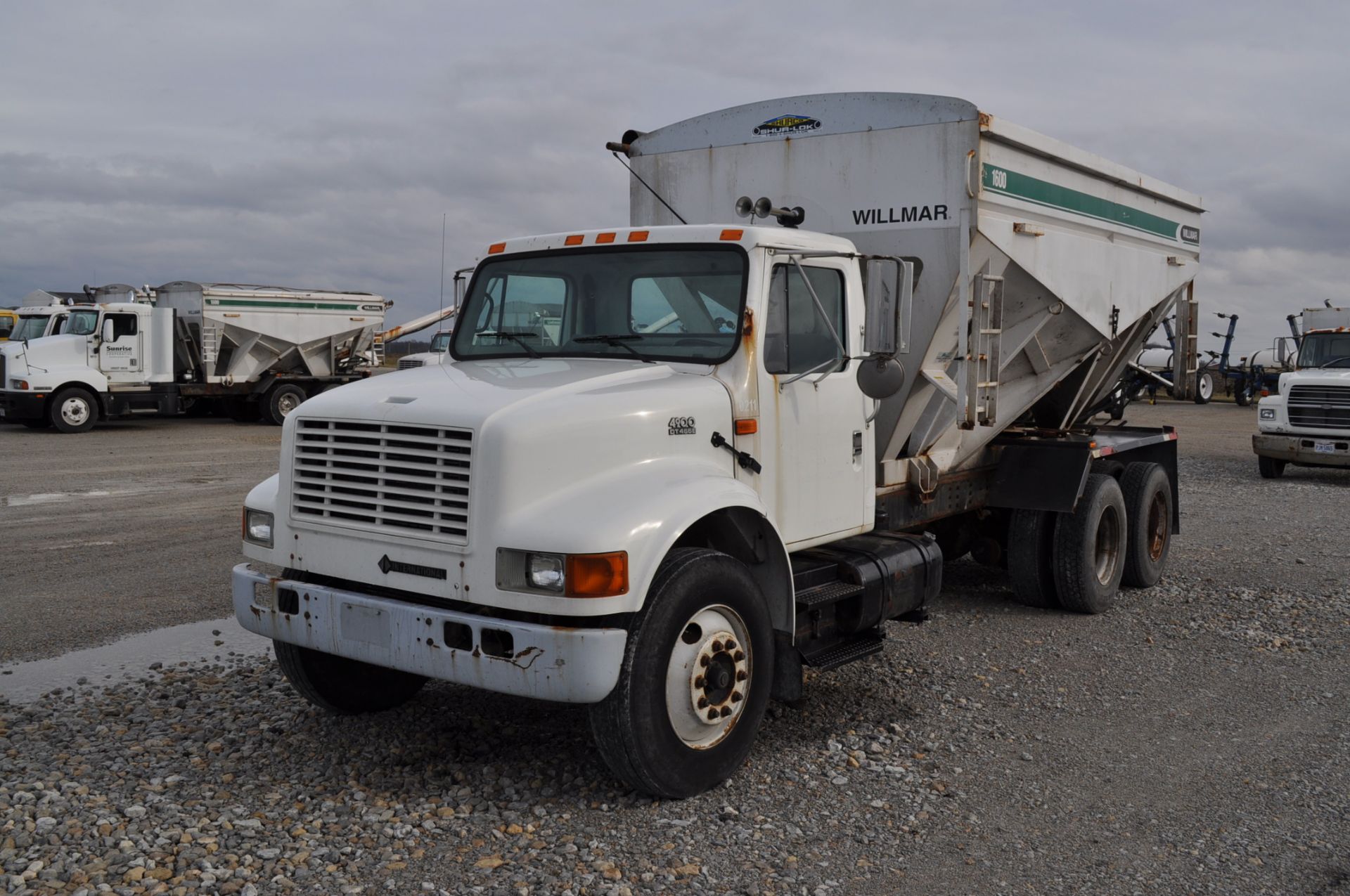 2002 International 4900 w/ Willmar 16-ton bed, rear auger, DT466E engine needs work, 7-speed, PTO