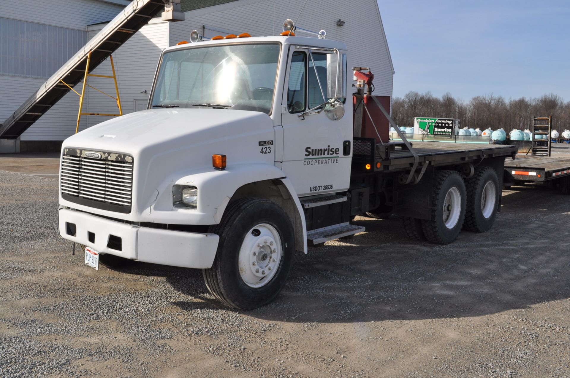 1996 Freightliner FL-80 w/15’ flat bed, 46,000 GVW, 5.9 Cummins, 9-speed, spring-ride, air-ride