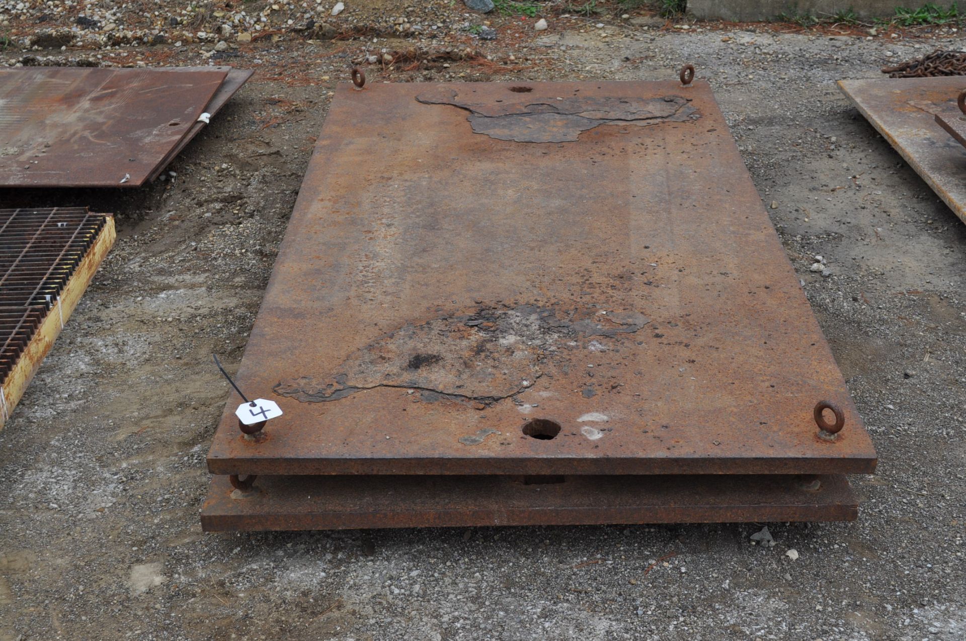 (2) Steel plates 4' x 8' x 1 3/8" with 4 lifting eyes and holes for lifting, used as crane jack pads