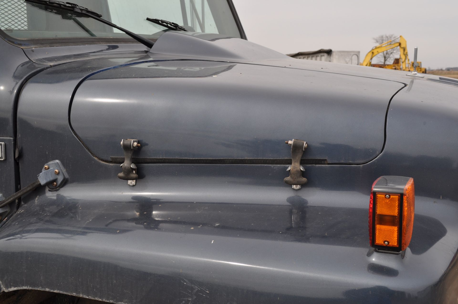 1988 International S1954 dump truck, 16’ steel bed w/ fold down sides, single axle, DT 466 engine - Image 16 of 25