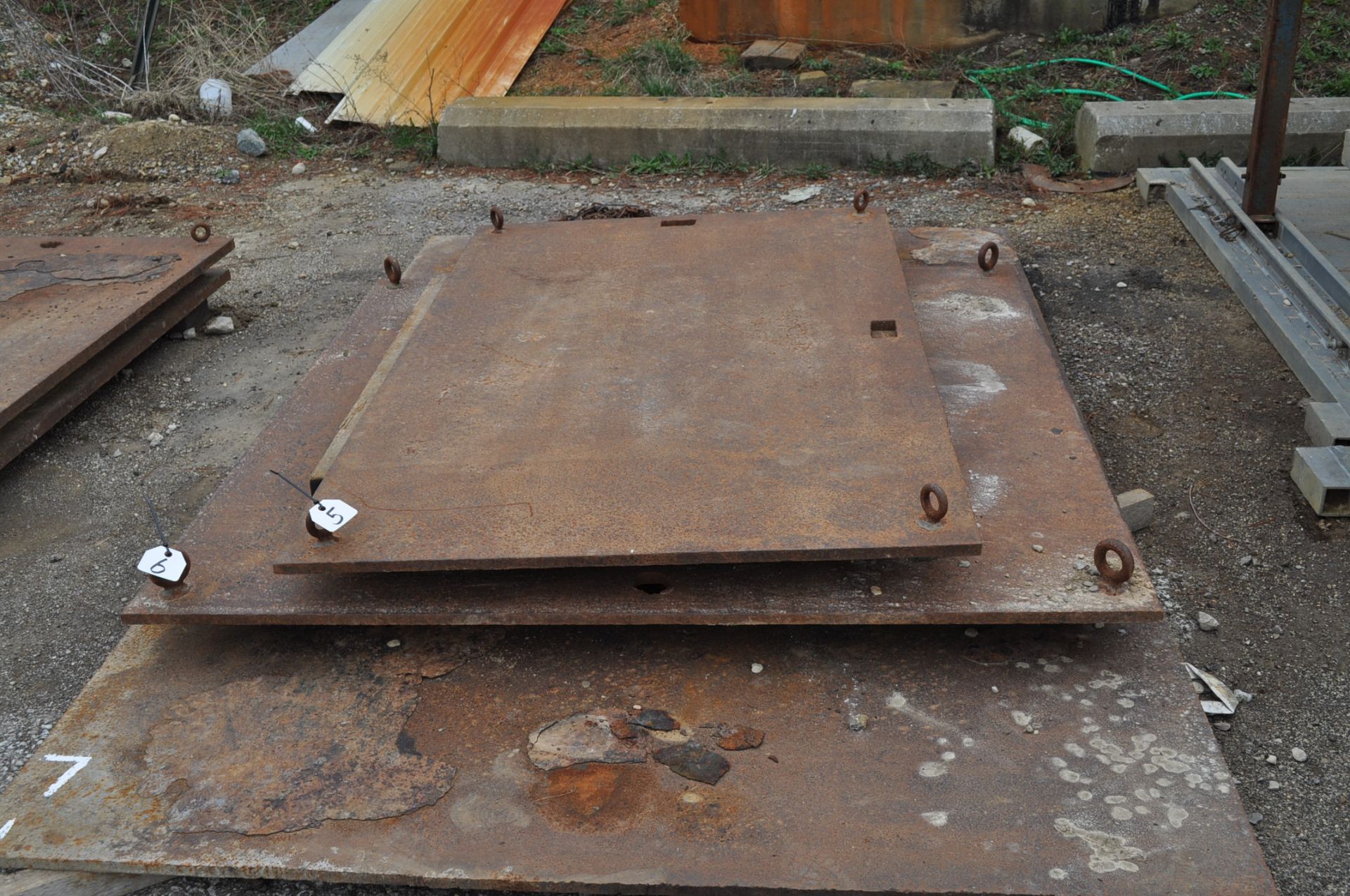 Steel plate 4' x 80" x 7/8" with eyes holes for lifting, used as crane jack pads