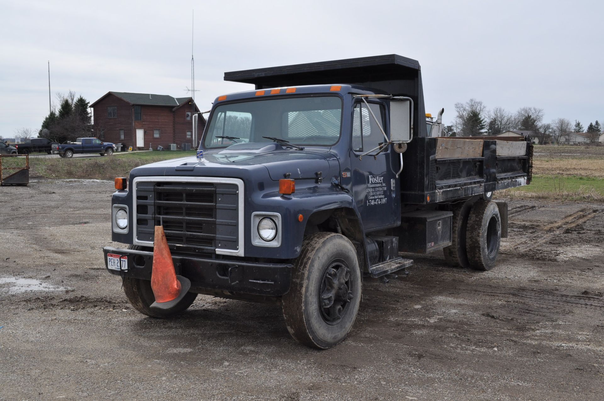 1988 International S1954 dump truck, 16’ steel bed w/ fold down sides, single axle, DT 466 engine