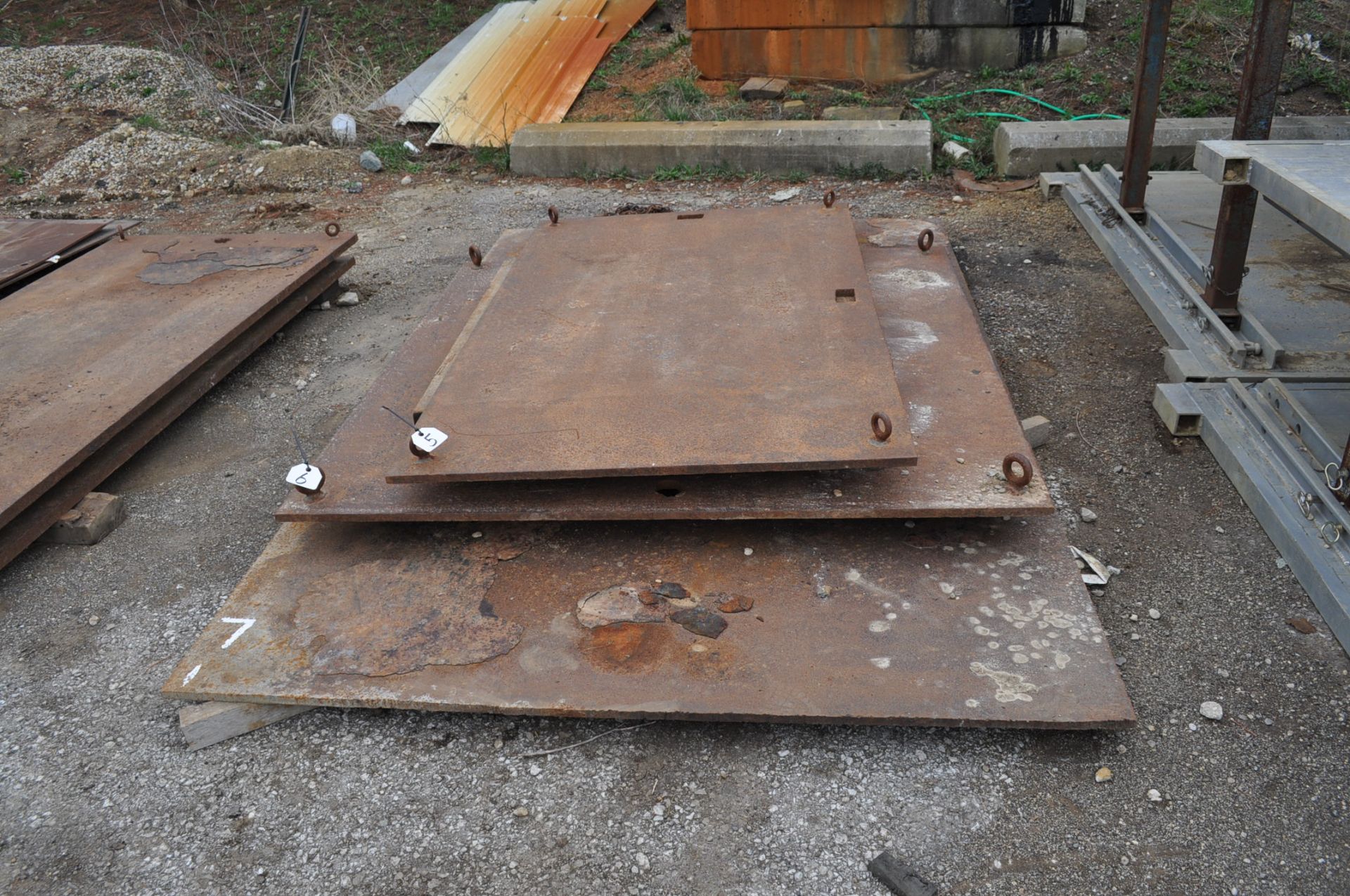 Steel plate 6' x 6' x 7/8" with 4 eyes for lifting, used as crane jack pads