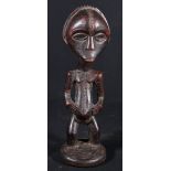 DRC, Luba fertility figure with scarified large face, circular base,