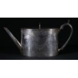 Victorian silver teapot of oval form with garland engraved decoration,