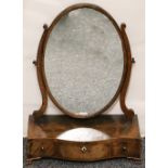 George III chequer strung serpentine mahogany toilet mirror with oval plate and bracket feet,