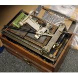 19th century printer's press within oak case and eight drawers of type.