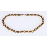 15 carat gold necklet of circular and reeded oval links, 31.