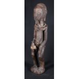 African Standing male tribal figure with small beard, scarified body and face,