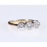 18ct gold and platinum set three stone diamond ring, approx. total 0.8cts, weight combined 3.5g.