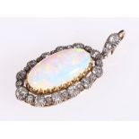 Edwardian opal and diamond pendant with oval cabochon opal, 21mm x 11mm,