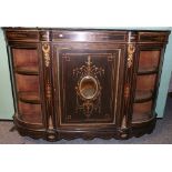 19th century ebonised credenza of demi lune form with central panel door flanked by convex glass