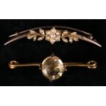 Edwardian floral crescent brooch set with seed pearls and a citrine set bar brooch,